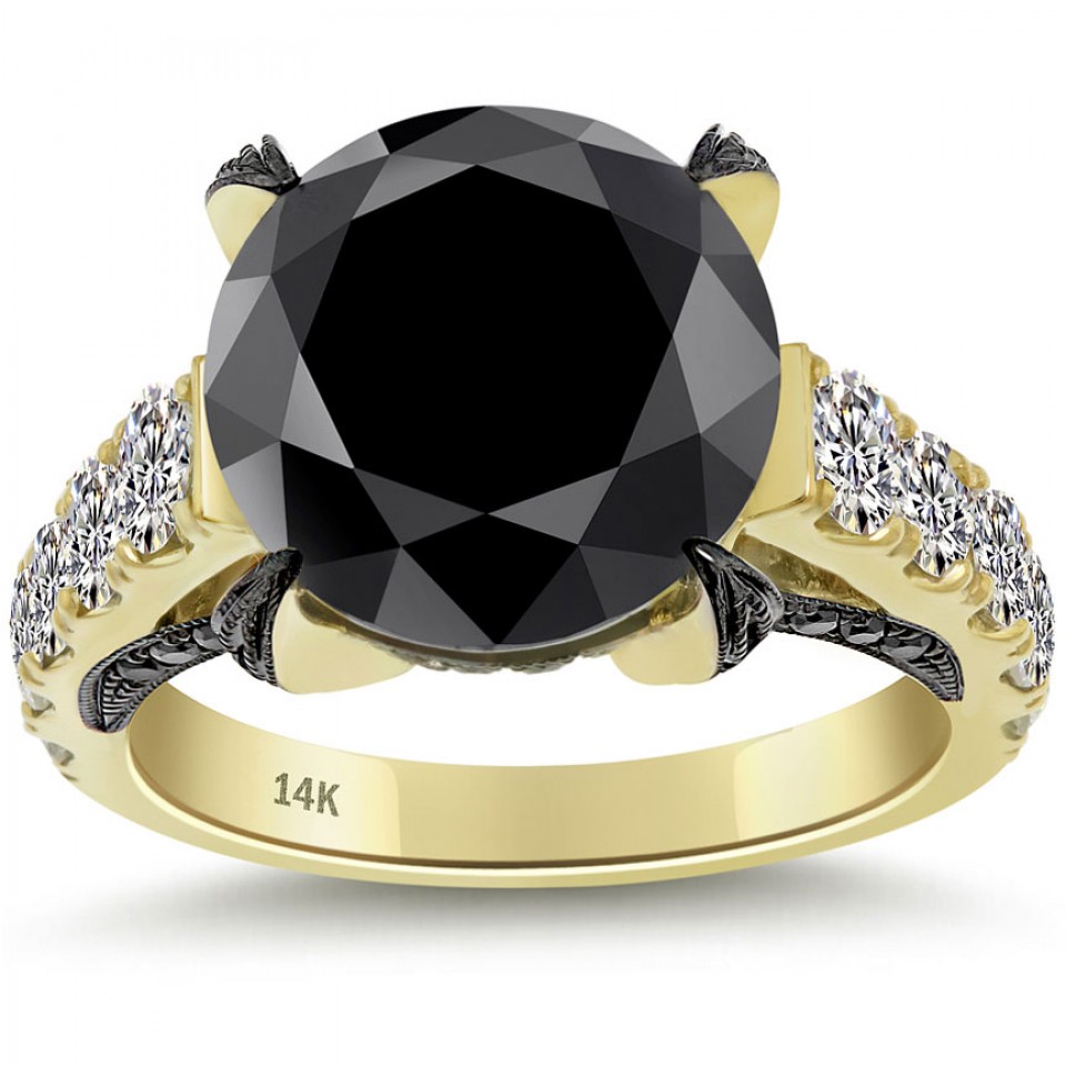 ... black diamond engagement ring is made in 14k yellow and black gold